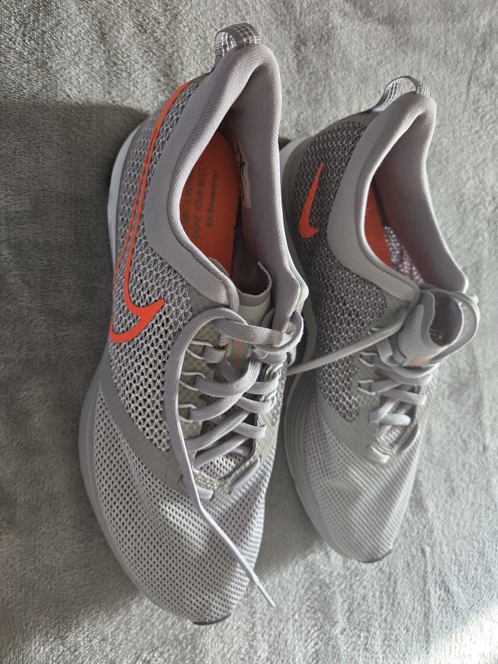 Nike Women's Light Gray Mesh Running Sneakers with Orange Swoosh